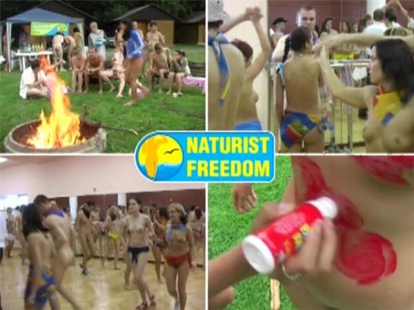 Family nudism - game competition in volleyball outdoors