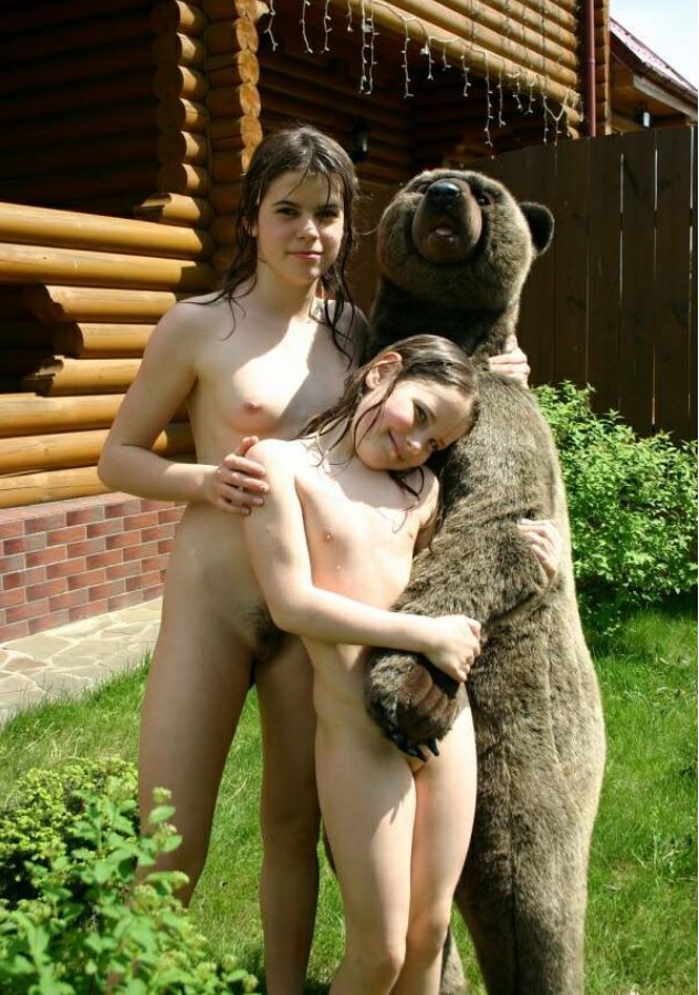 Family nudism of a photo at a dacha