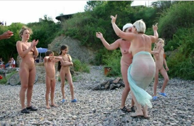 Nudists dance