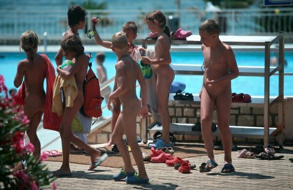 Family nudism in the aquapark territory